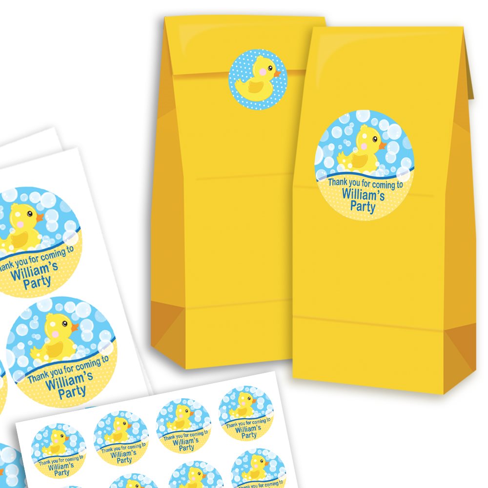 Yellow party favor bags with rubber duck party favors on a white background