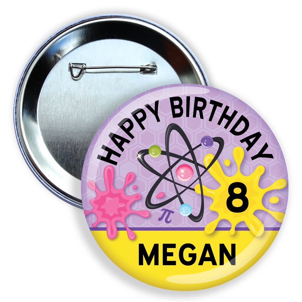 Button badge with 'Happy Birthday Megan 8' text and atom design on a purple and yellow background