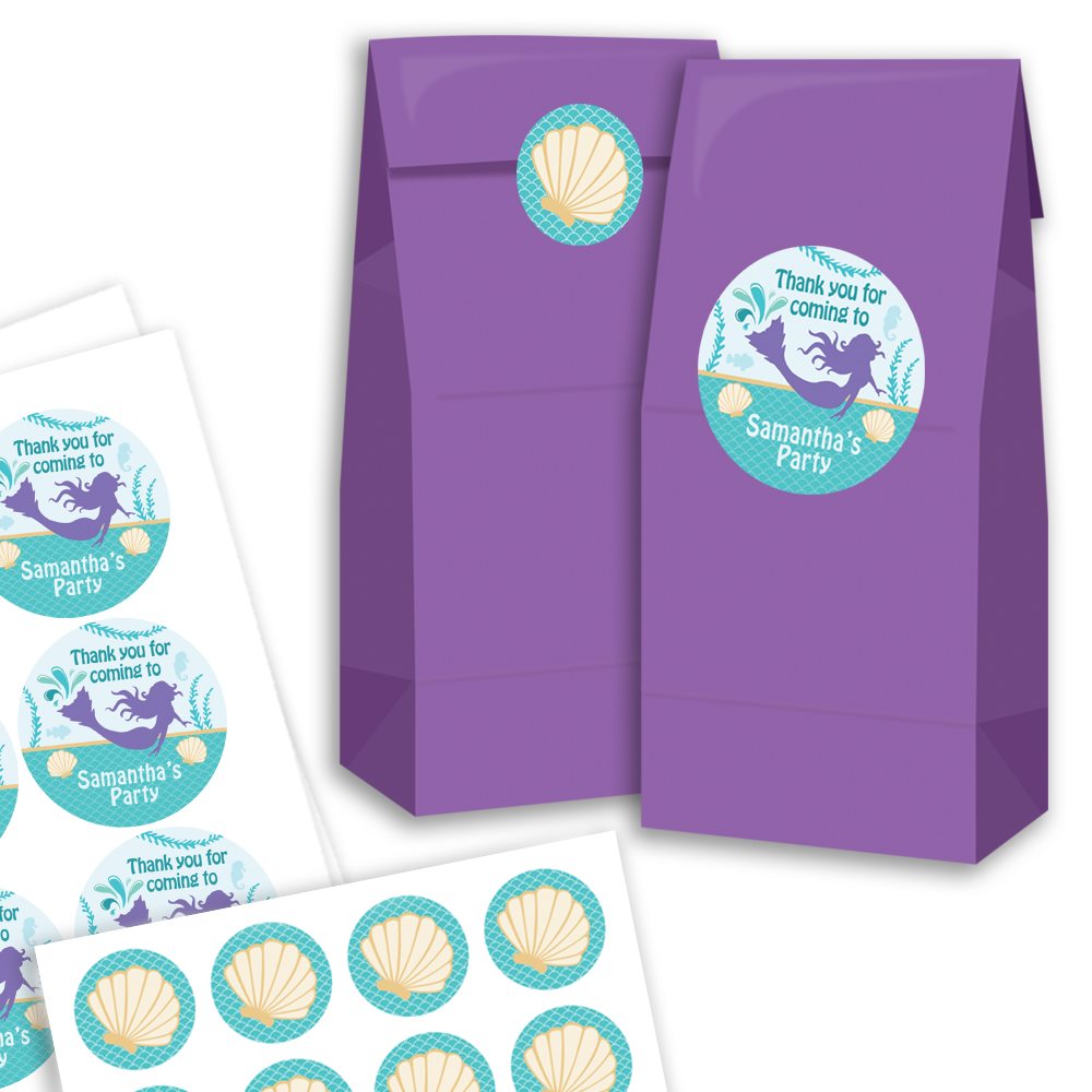 Purple party favor bags with personalized stickers featuring mermaids and shells on a white background.