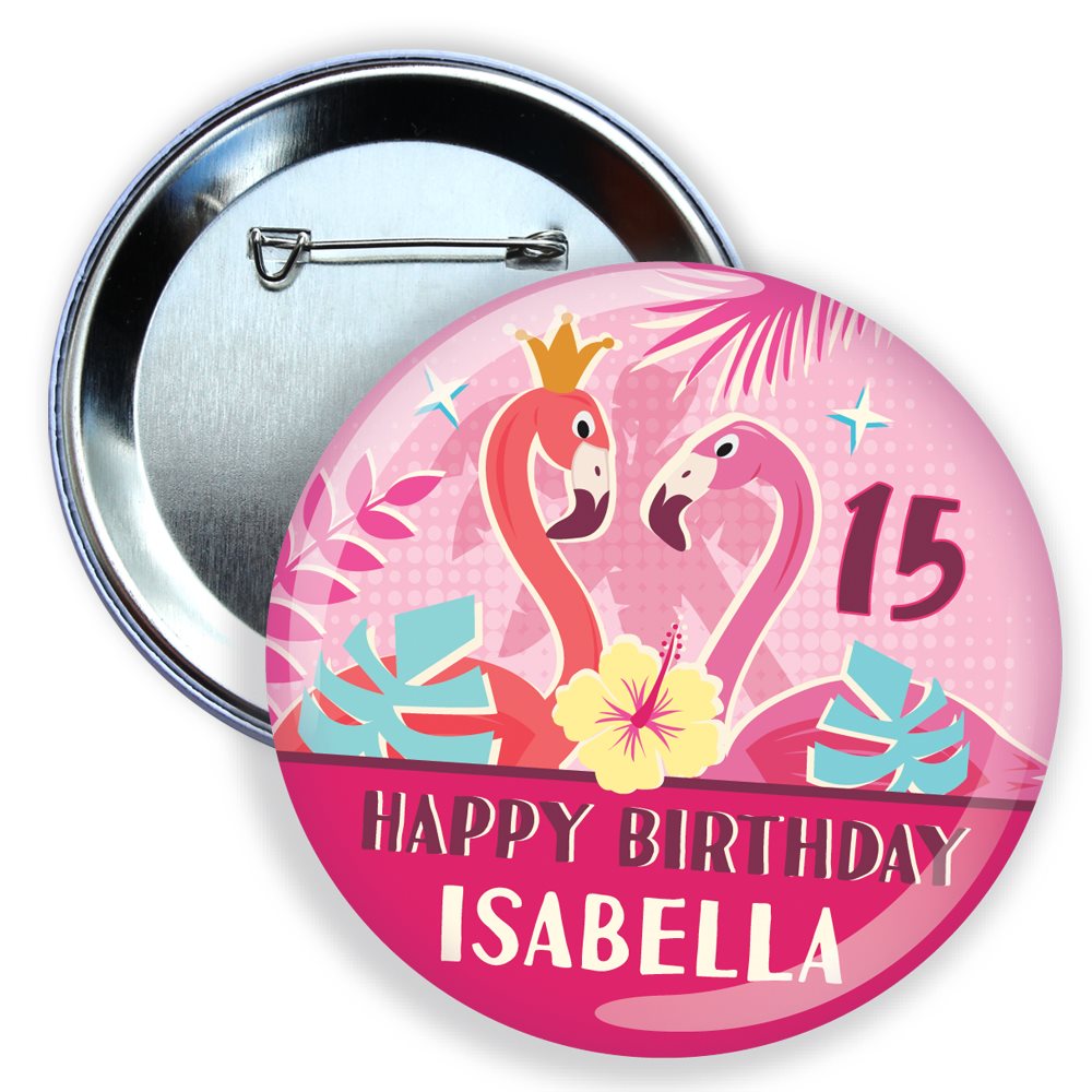 Round pink birthday button with flamingo design and text 'Happy Birthday Isabella' on a white background