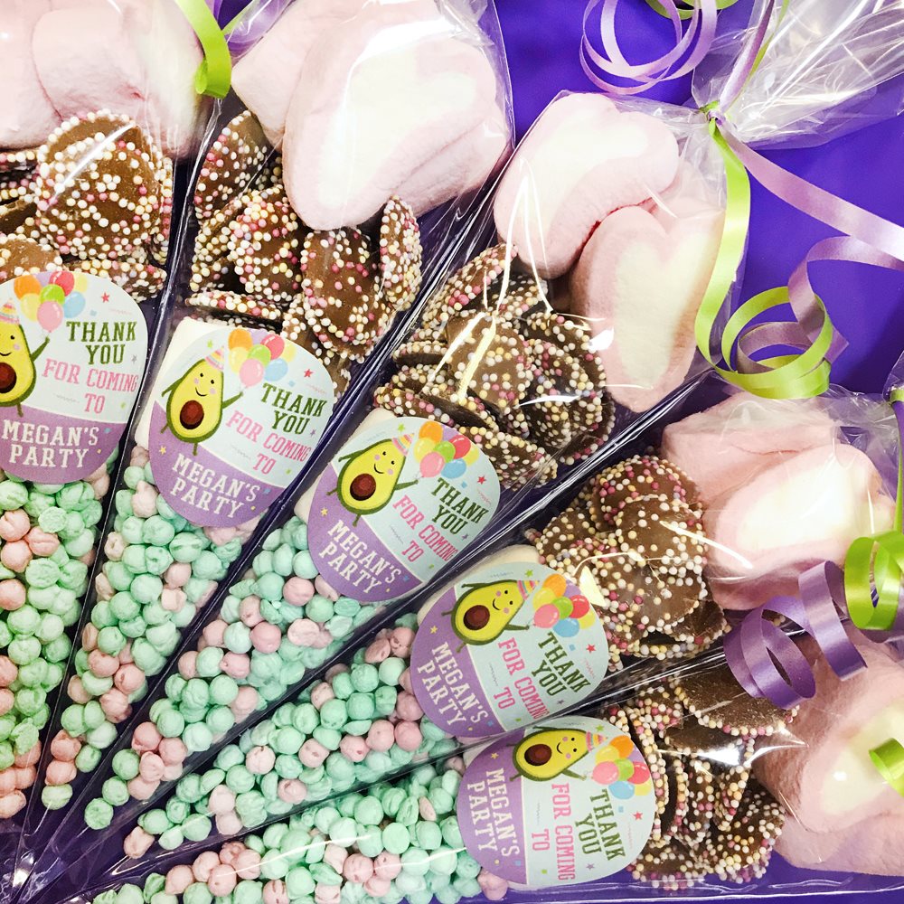 Party favours with 'Thank you for coming to My Party' labels, with a cute avocado design