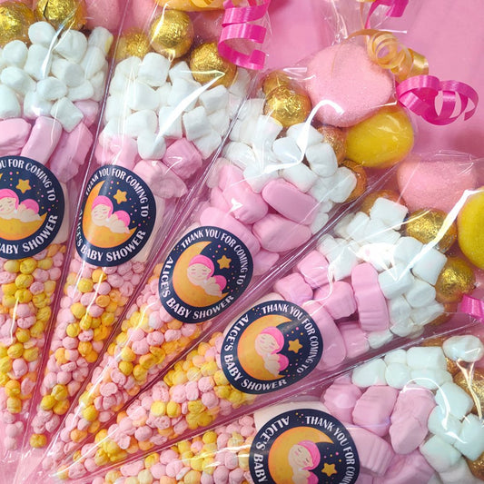 Baby shower candy bags with colorful candies and 'Thank you for coming to our baby shower' labels.