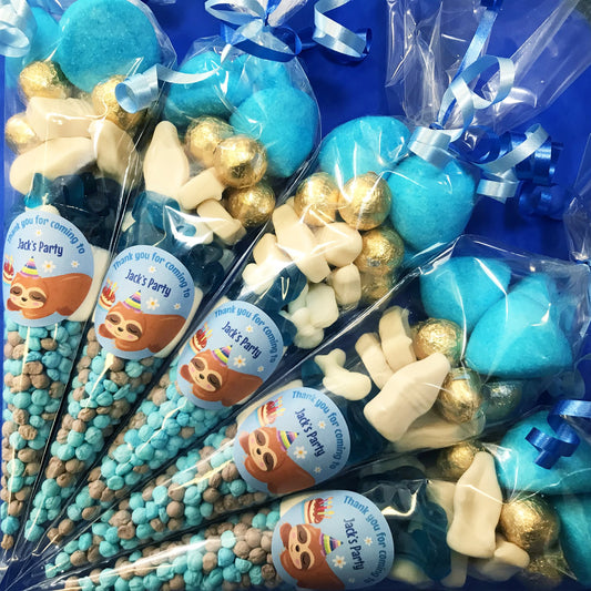 Party favour cones with blue and gold treats and personalised sloth labels.