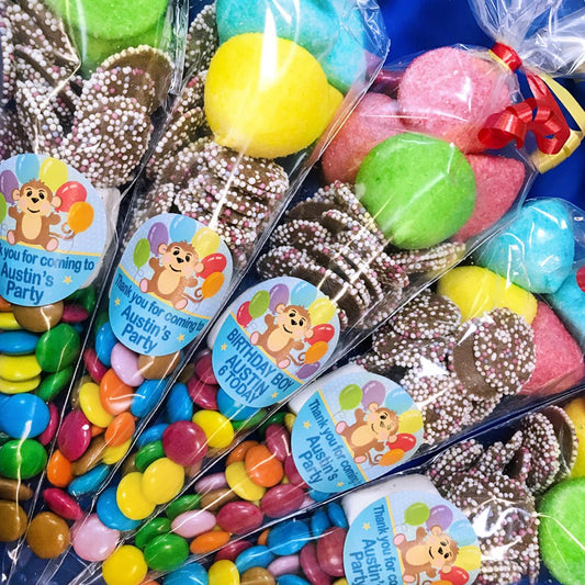 Kids party pre filled sweet cones with custom birthday stickers