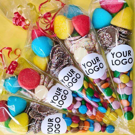 Colorful candy assortment in clear bags with 'Your Logo' labels for company logo