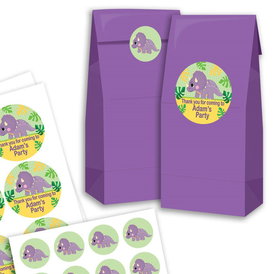 Purple party favour bags with dinosaur-themed stickers on a white background