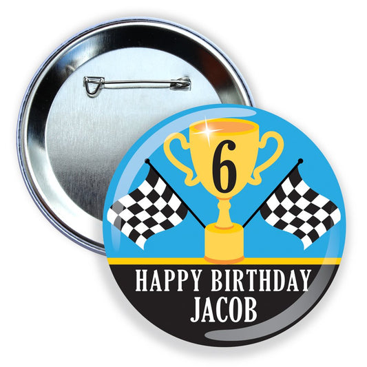 Button badge with a trophy and checkered flags for a 6th birthday celebration, personalized with 'Happy Birthday Jacob'.