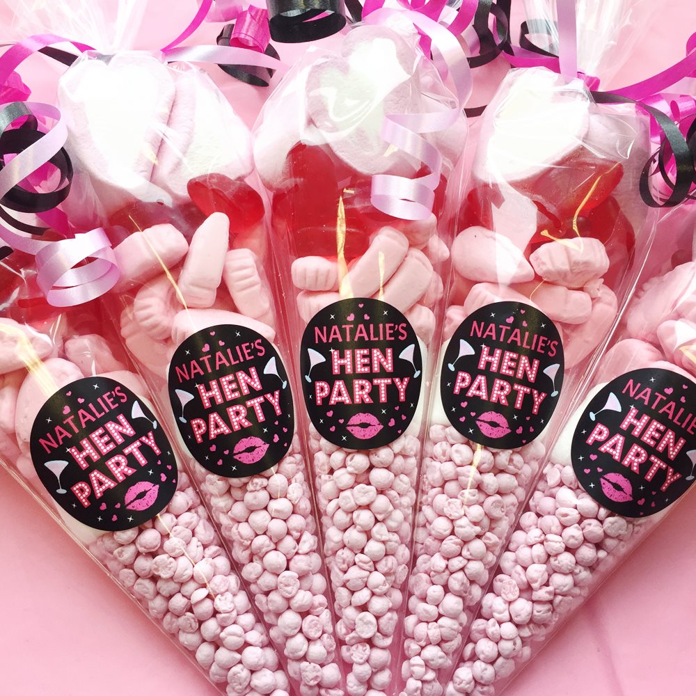 Pink sweet cones with 'Natalie's Hen Party' labels on a pink background