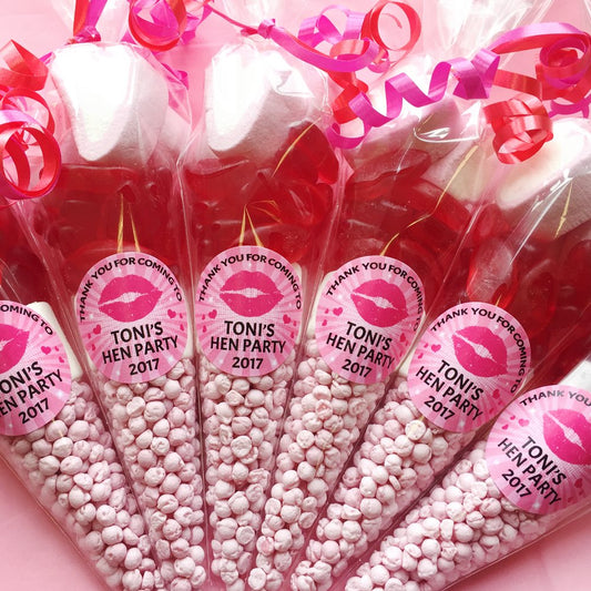 Bouquet of pink and red sweets with 'TONI'S HEN PARTY 2017' labels on a pink background.