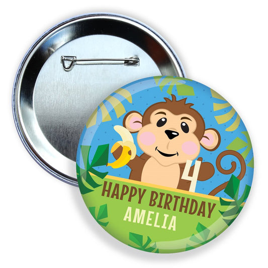 Button badge with a monkey design and 'Happy Birthday Amelia' text on a blue and green background.