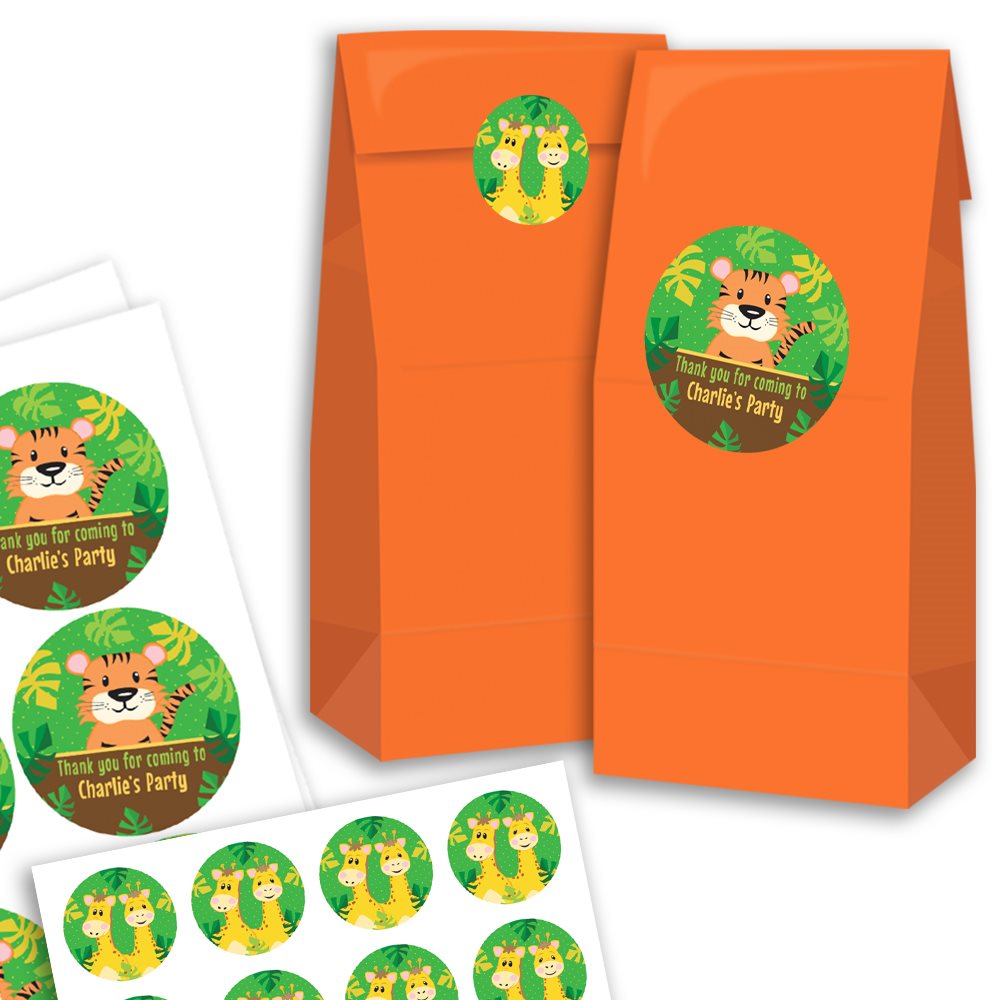 Orange party favour bags with jungle-themed stickers on a white background