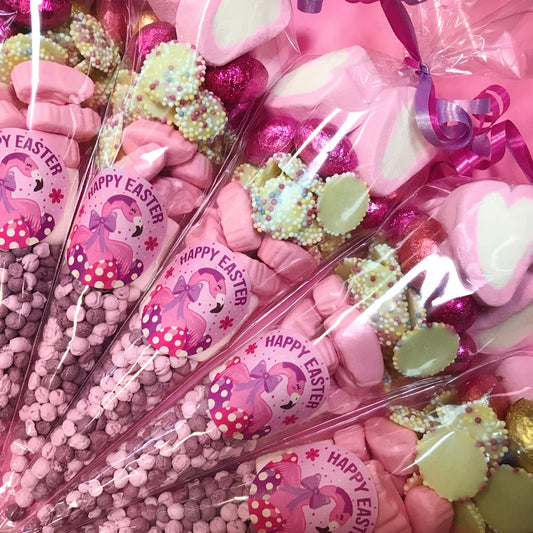 Candy cones with pink 'Happy Easter' labels and colorful candies.