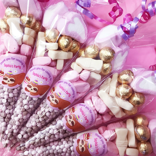 Party favors with pink and gold candies and 'Thank you for coming to Sophia's Party' labels.