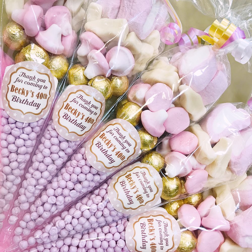 Pre-filled sweet cones party favours with custom birthday stickers