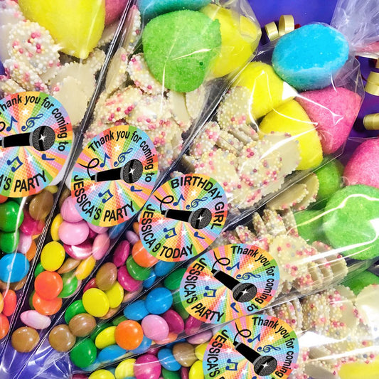 Colorful candy assortment with personalized 'Thank you for coming to My Party' labels.