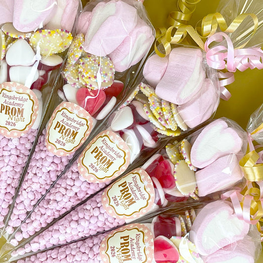 Prom-themed candy sweet cones with pink and gold ribbons and 'Kingsbridge Academy Prom 2026' labels.