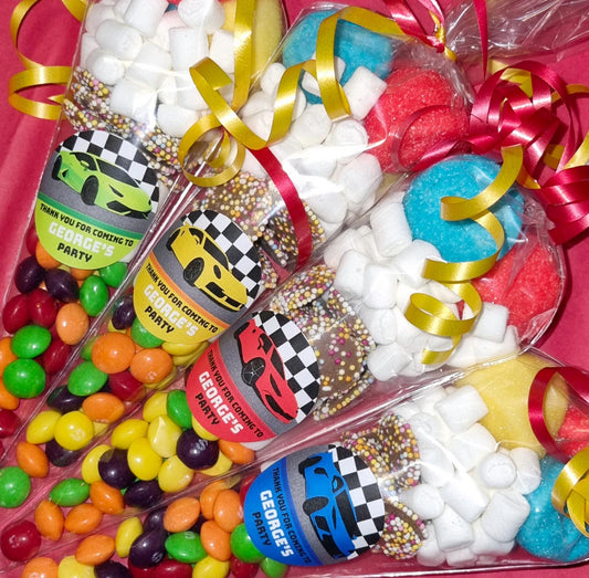 Personalized sweet cones with a race car theme, containing various candies and decorated with car-like patterns and ribbons.