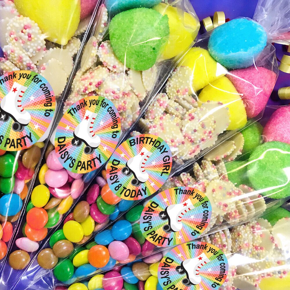 Personalised party sweet cones with pre filled sweets and birthday stickers