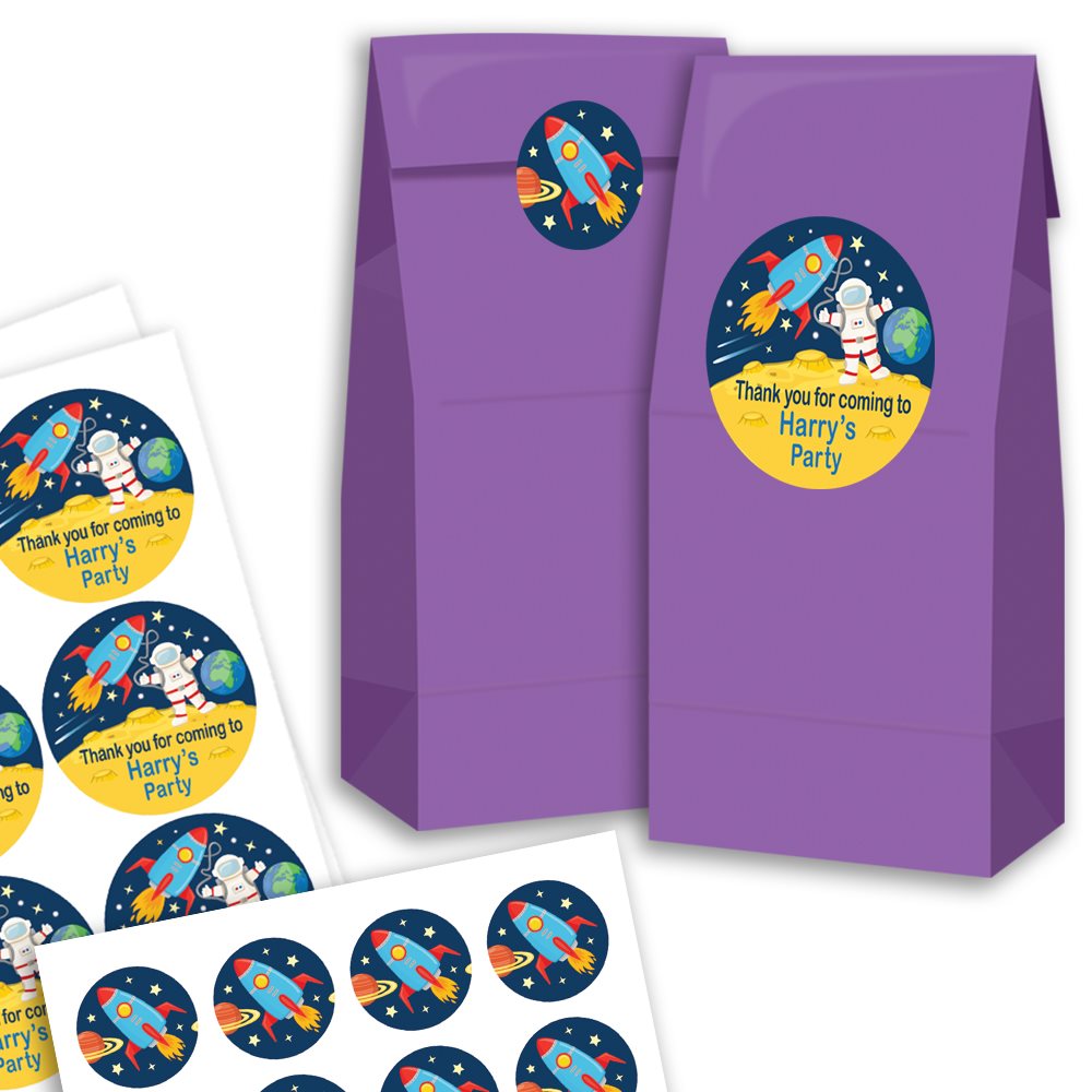 Purple party favour bags with space-themed stickers on a white background