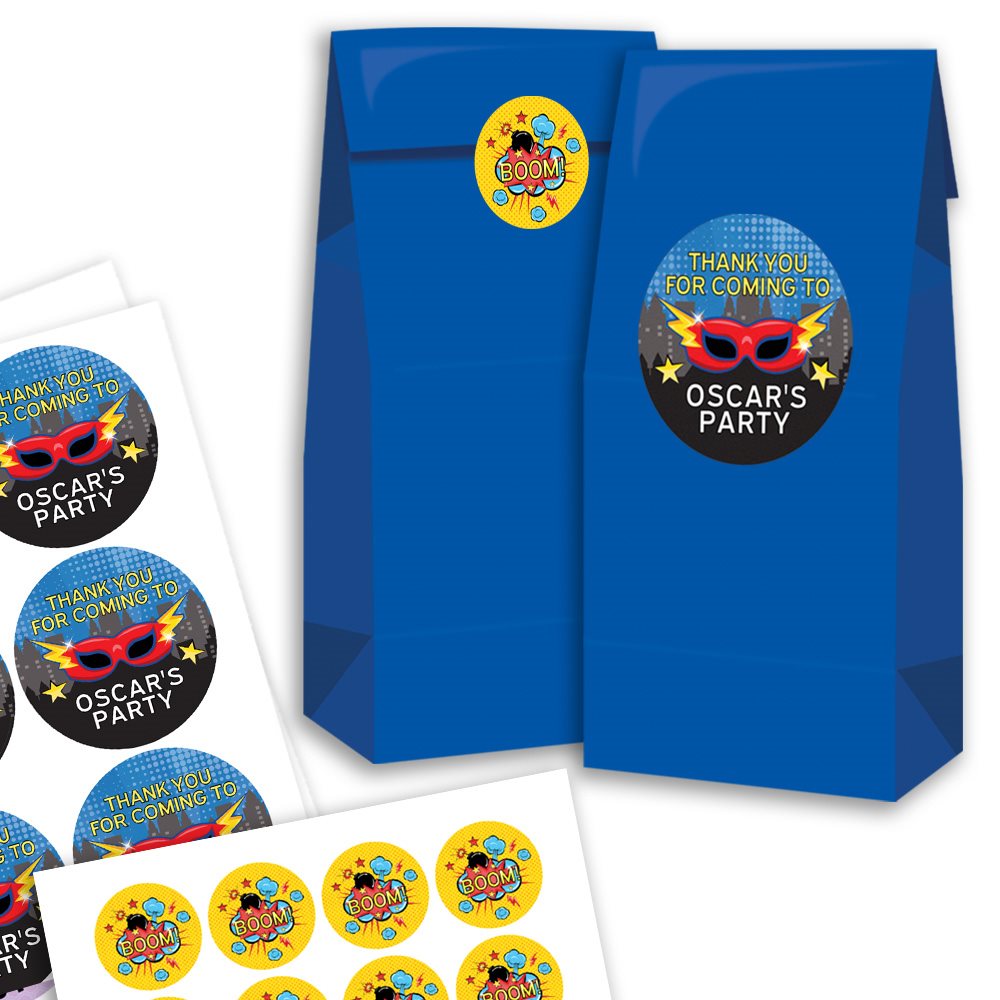 Blue party favor bags with personalized stickers on a white background
