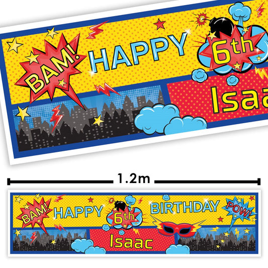 Superhero-themed birthday banner with 'Happy 6th Birthday Isaac' text, featuring colorful graphics and a cityscape design.