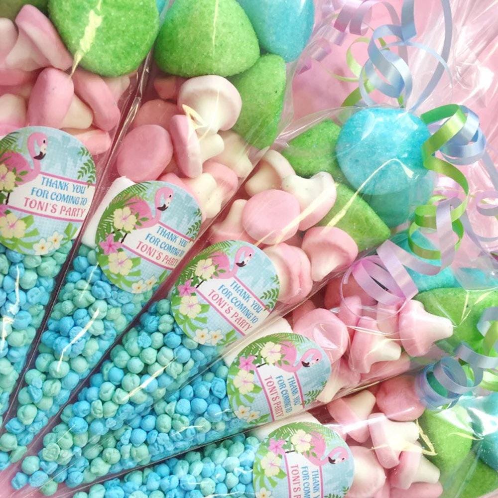 Pre-filled sweet cones with a tropical flamingo theme, wrapped individually and tied with a ribbon