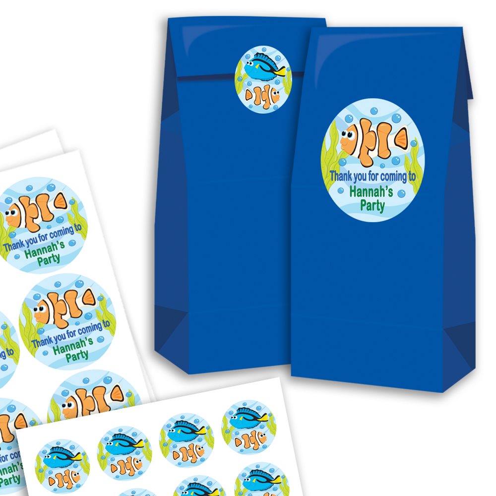 Blue party favour bags with personalised stickers featuring cartoon fish characters on a white background.
