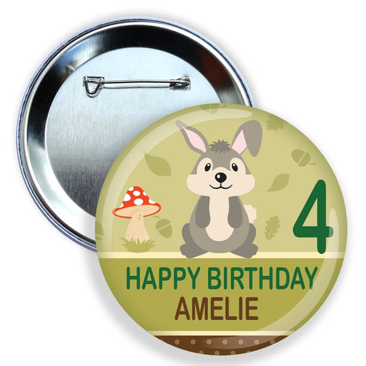 Round birthday button with a cartoon rabbit, mushroom, and text on a green background