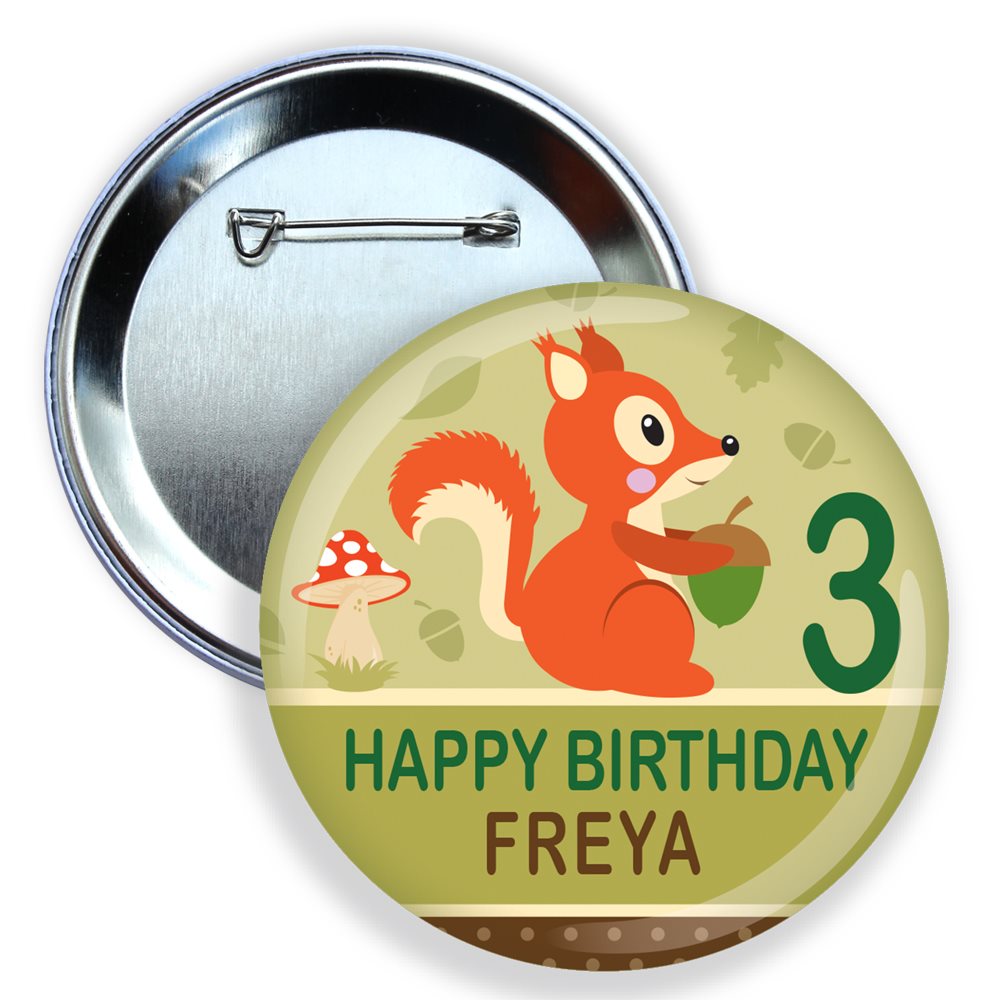 Button badge with a squirrel holding a nut, mushroom, and text 'Happy Birthday Freya 3' on a green background.