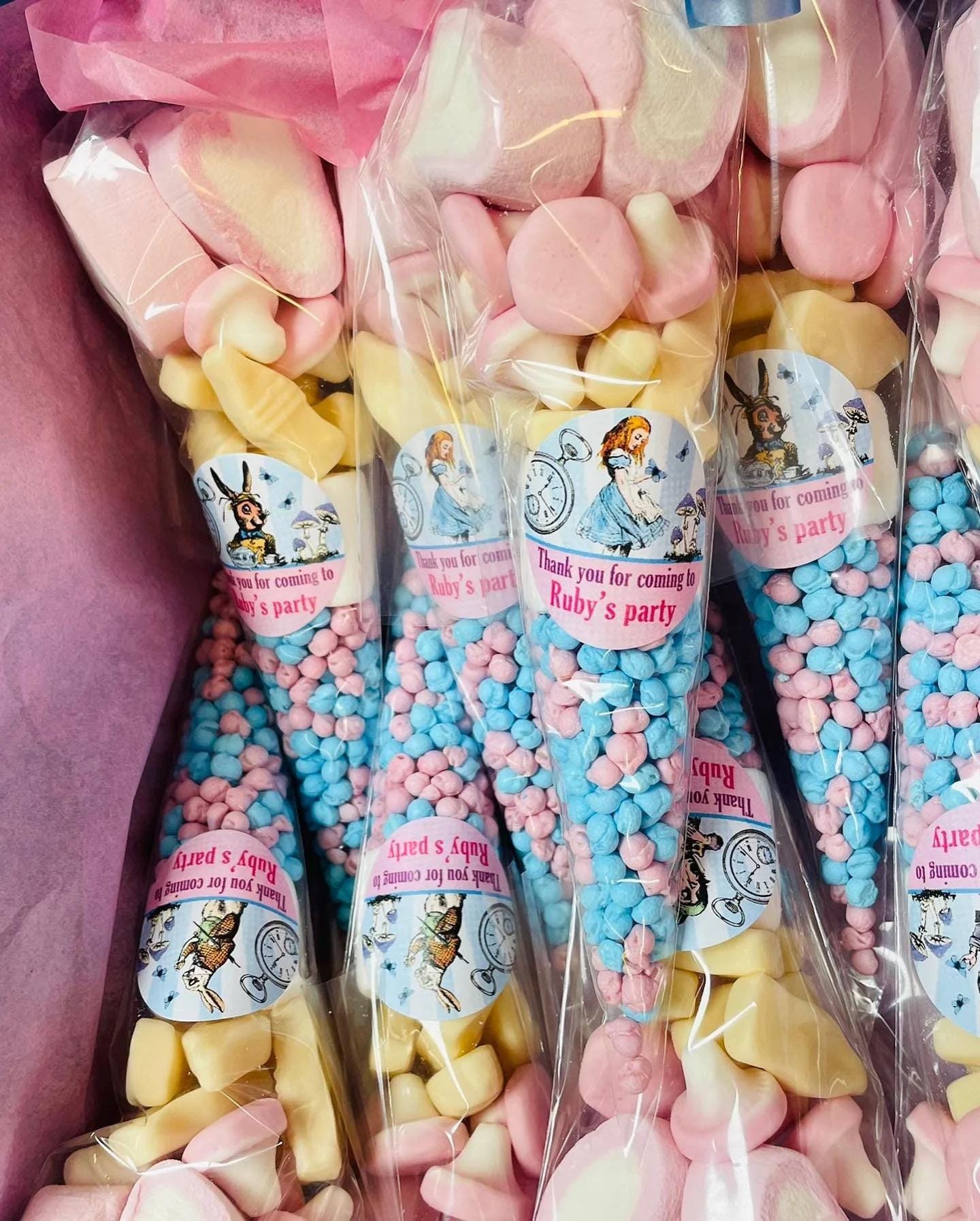 Personalised party sweet cones with pre filled sweets and birthday stickers